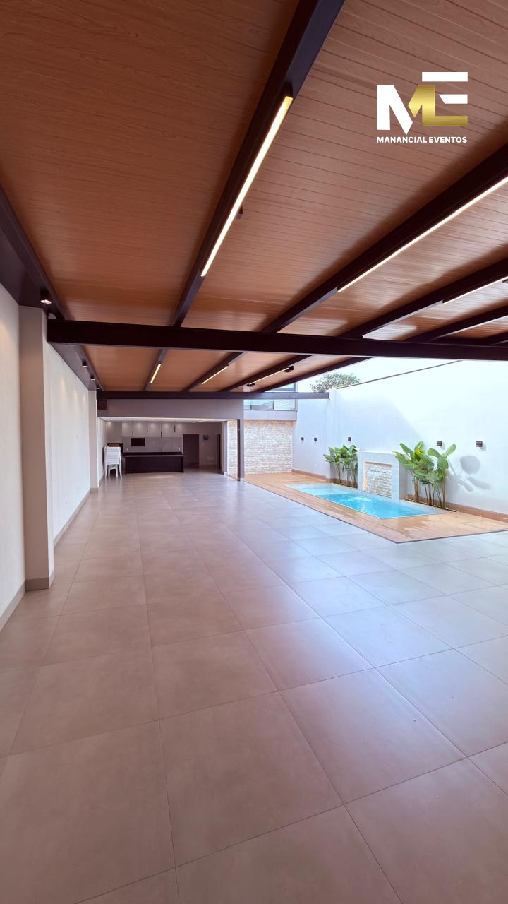 Salão coberto do Manancial integrado à piscina e à área gourmet